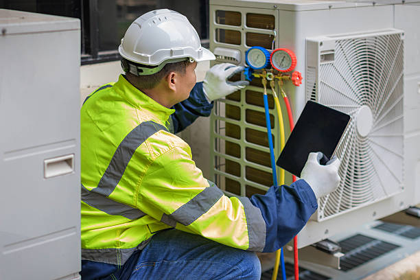 Professional Hvac technician working in Newton Highlands, MA